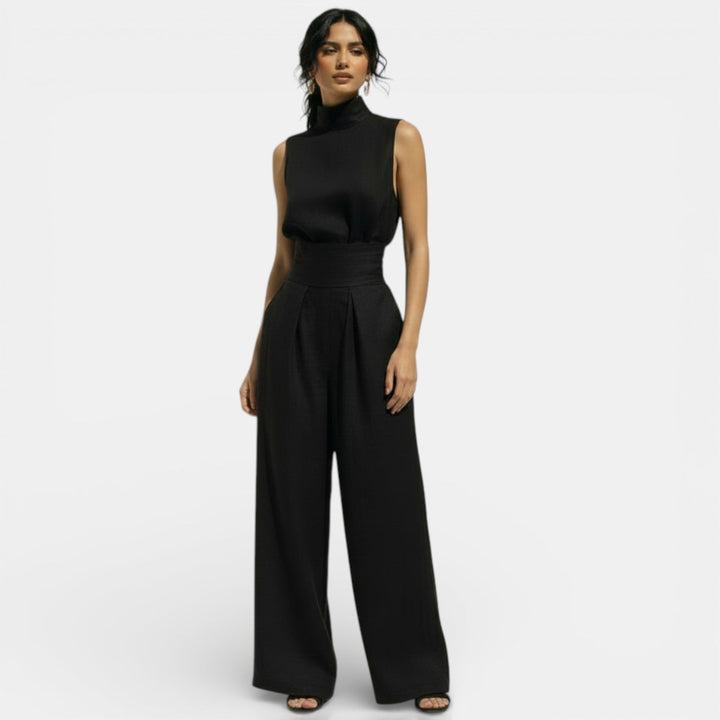 Completo da donna con collo alto, senza maniche, pantalone ampio a vita paperbag