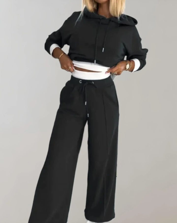 Completo due pezzi da donna con cappuccio e pantaloni ampi