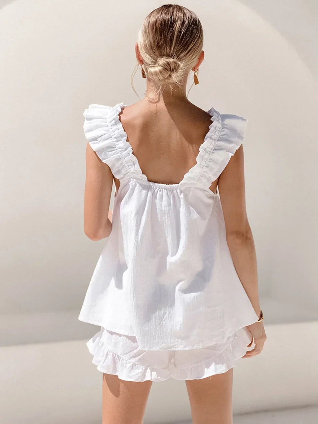 Completo donna top senza Manica con volant e short