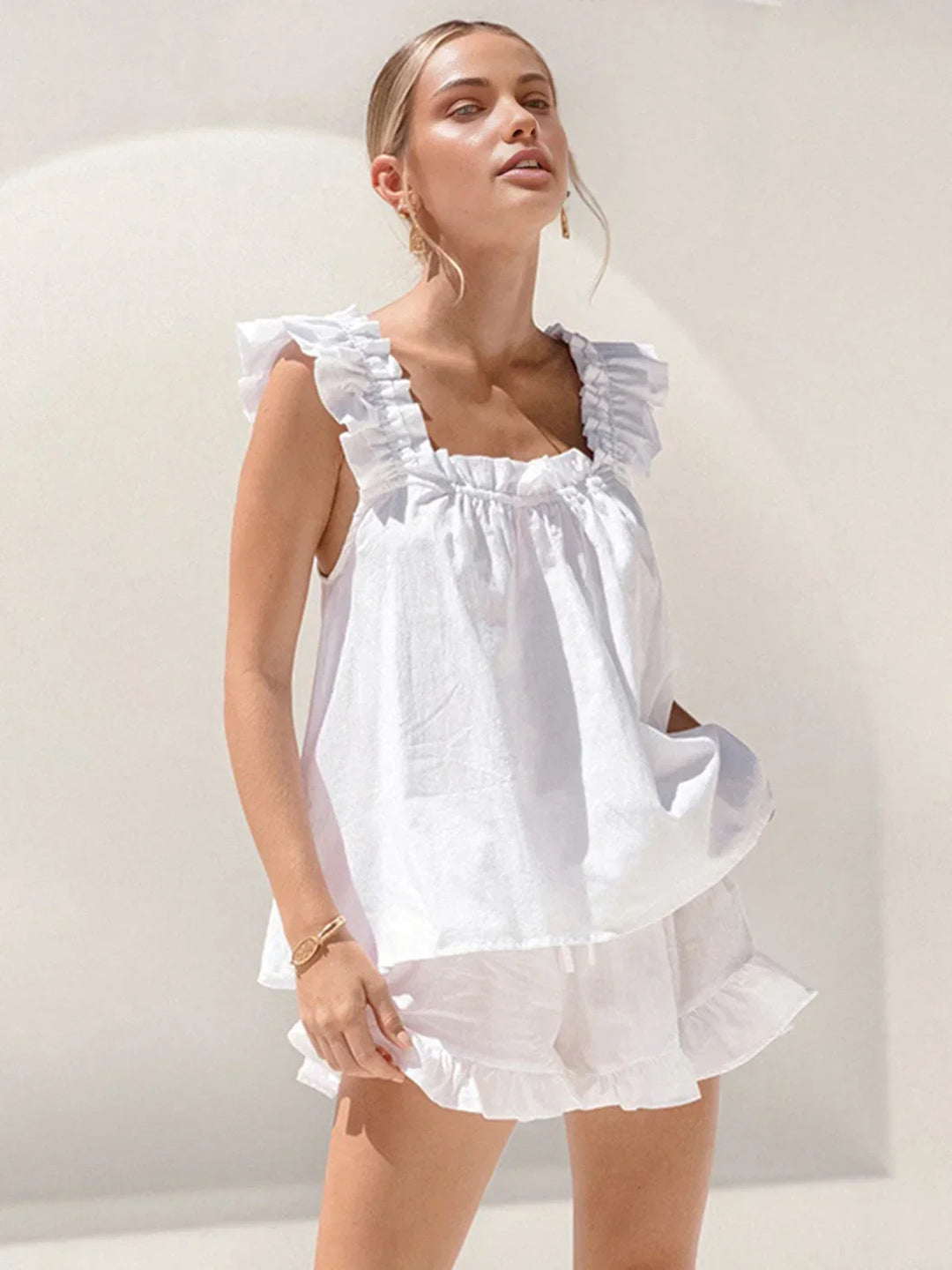 Completo donna top senza Manica con volant e short