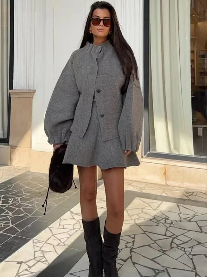 Completo grigio da donna gonna corta e blazer lungo a maniche lunghe