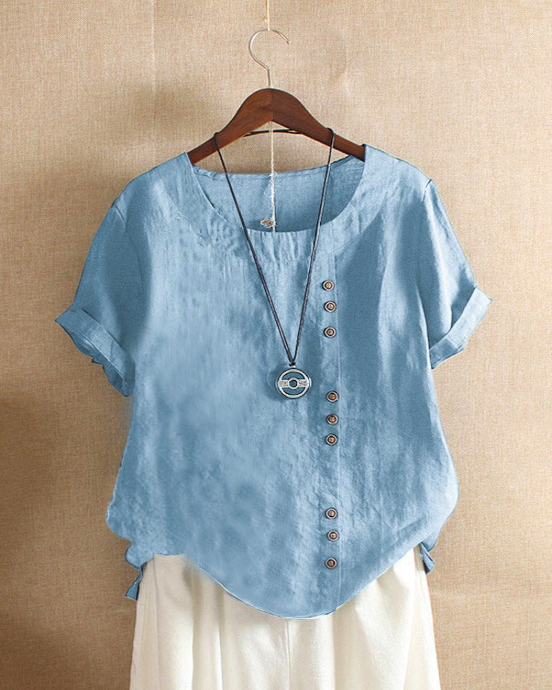 Blusa donna girocollo maniche corte risvoltate abbottonatura asimmetrica vestibilità ampia