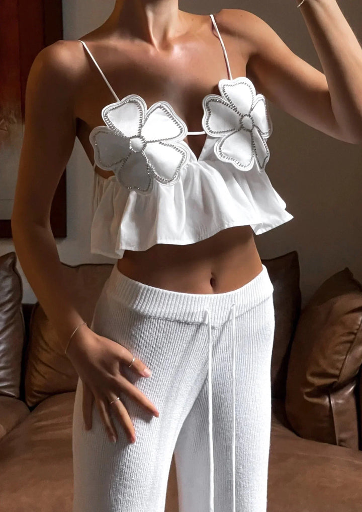 Top crop donna con applicazioni floreali e spalline sottili