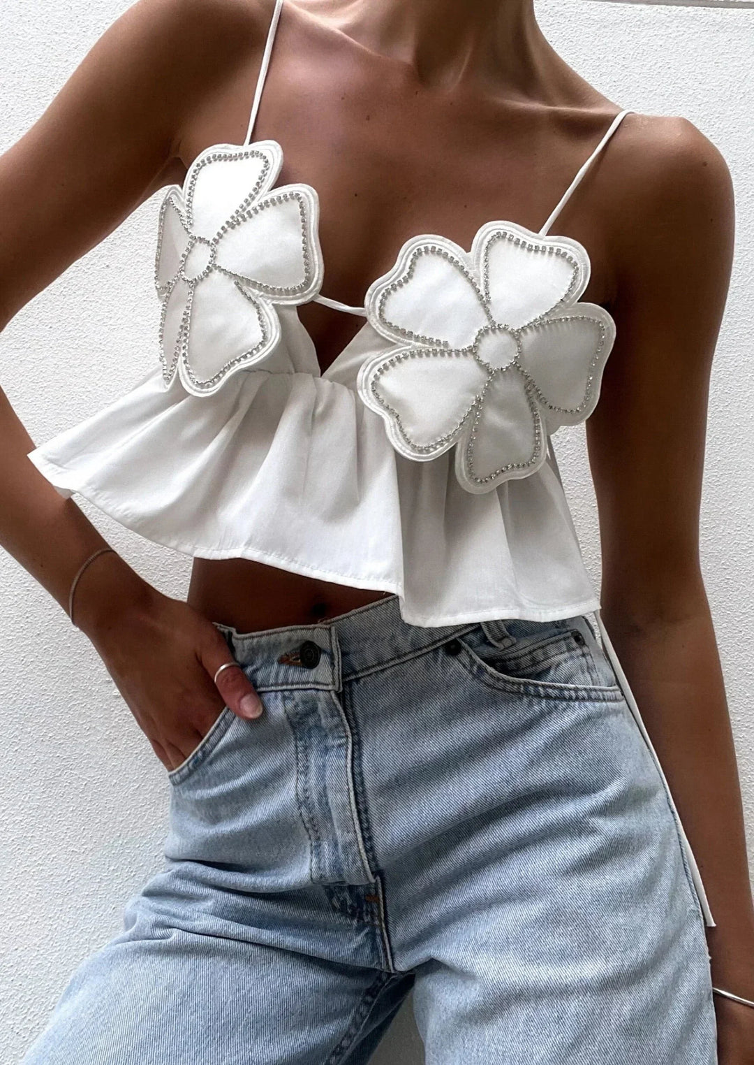 Top crop donna con applicazioni floreali e spalline sottili