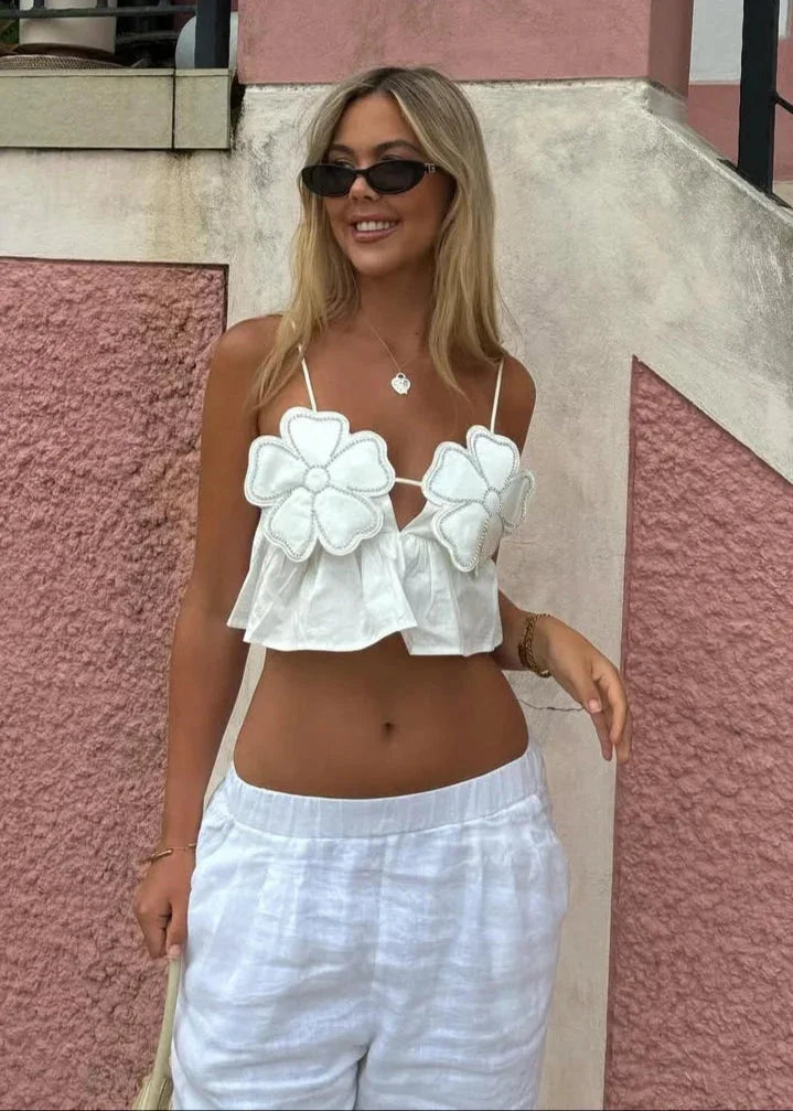Top crop donna con applicazioni floreali e spalline sottili
