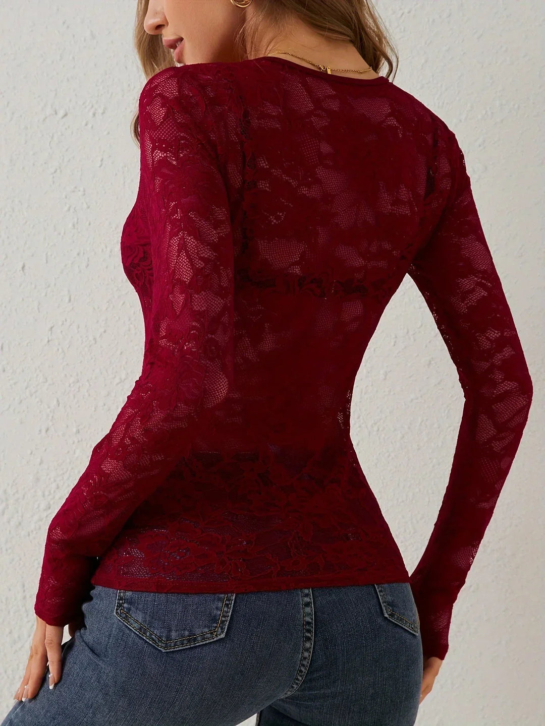 Top in pizzo da donna a maniche lunghe con scollo a V elegante