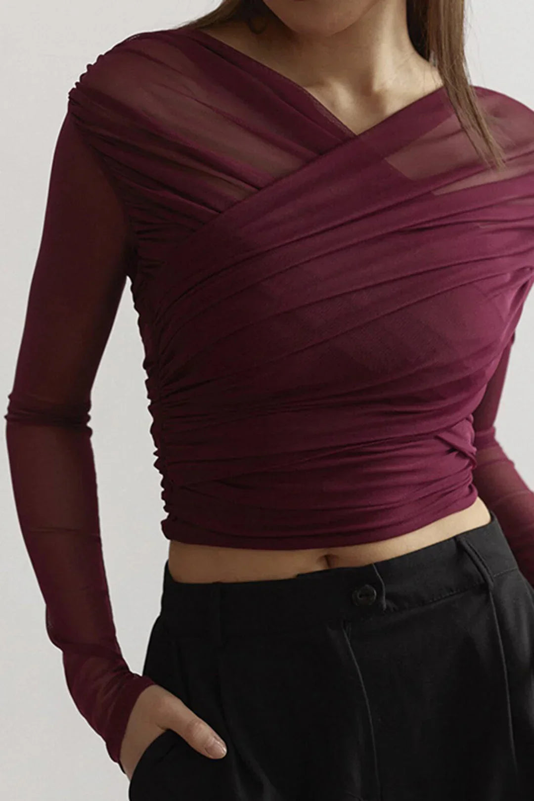 Top da donna a maniche lunghe con effetto plissettato trasparente