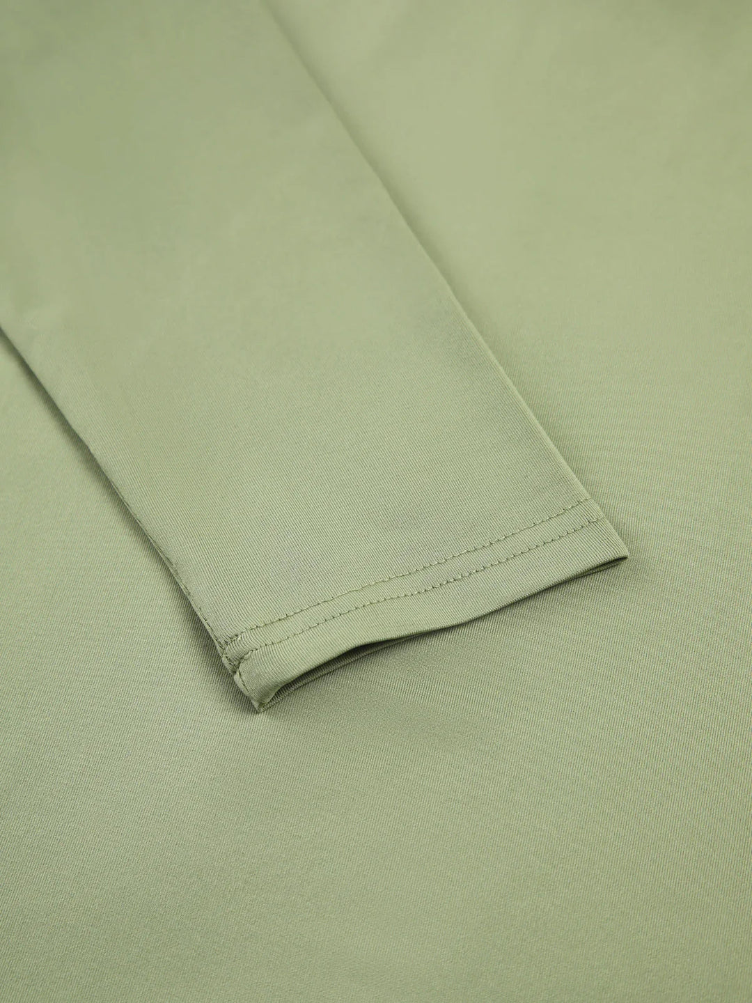 Top da donna a maniche lunghe elasticizzato dal design aderente