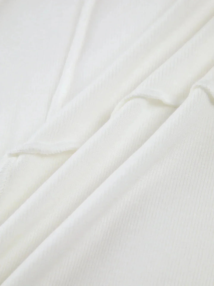 Top a maniche lunghe da donna con cuciture dettagliate