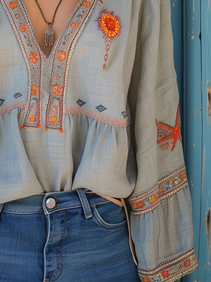 Blusa donna azzurro chiaro con scollo a V, ricamo multicolore, maniche lunghe