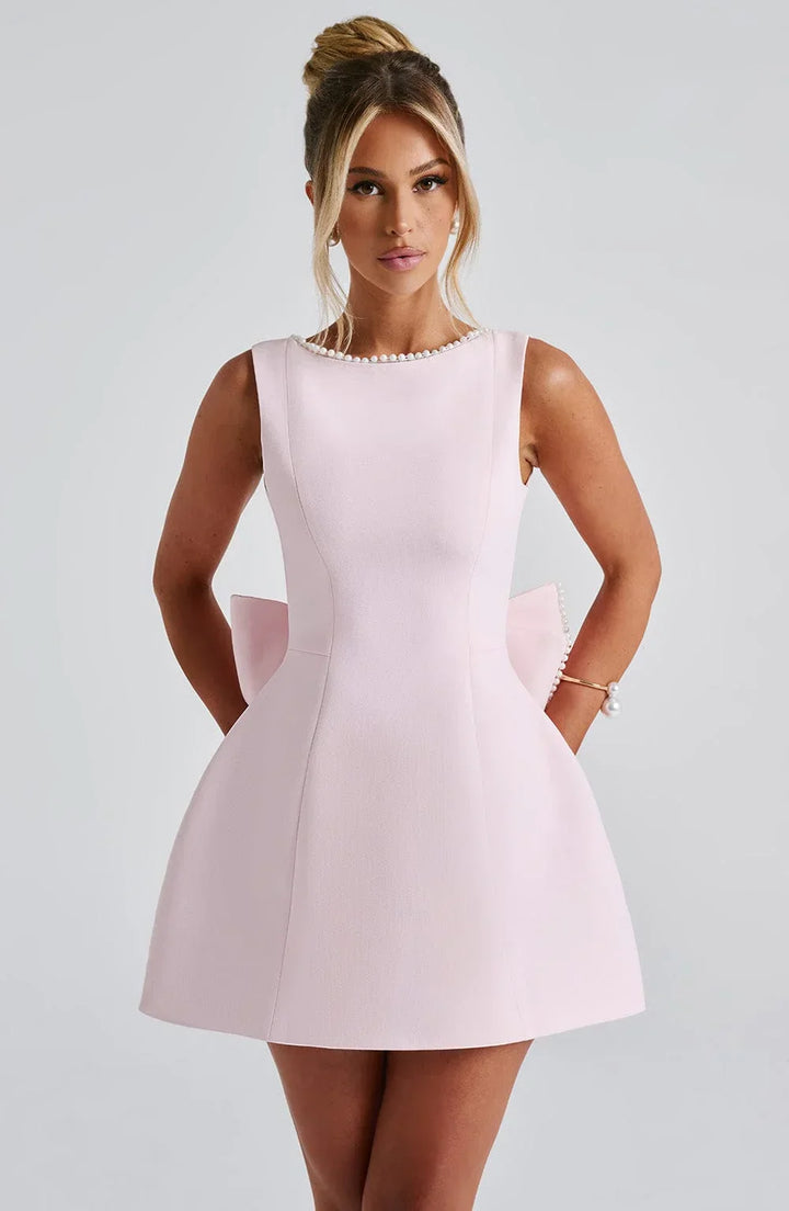 Vestito corto donna con fiocco decorativo sul retro
