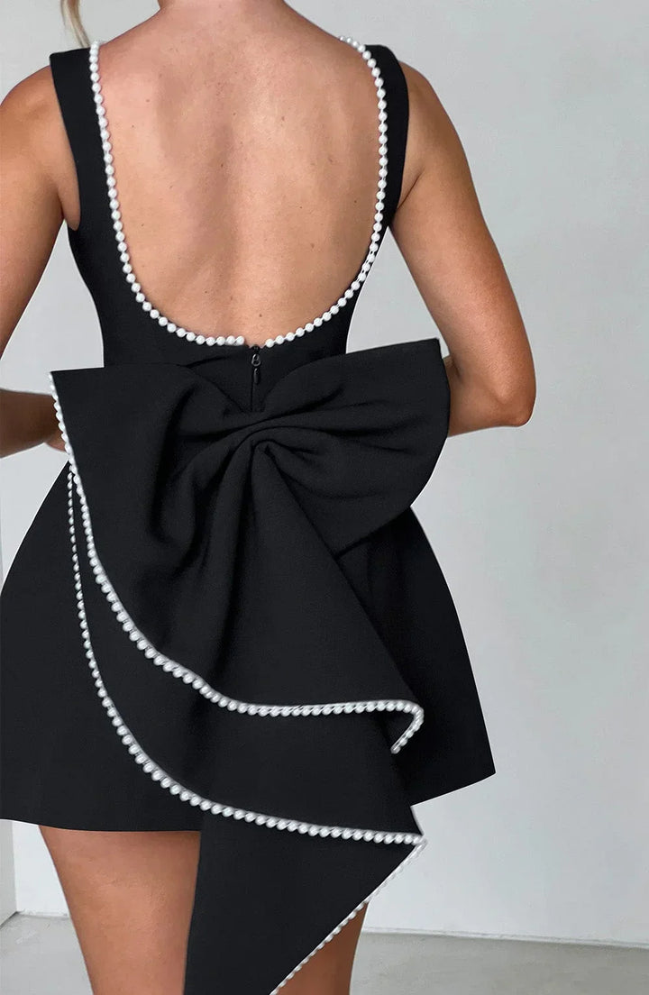 Vestito corto donna con fiocco decorativo sul retro