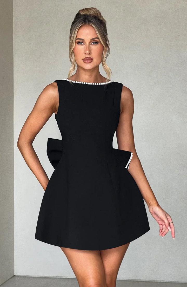 Vestito corto donna con fiocco decorativo sul retro