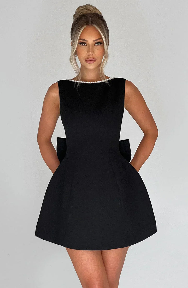 Vestito corto donna con fiocco decorativo sul retro
