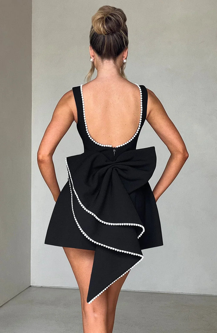 Vestito corto donna con fiocco decorativo sul retro