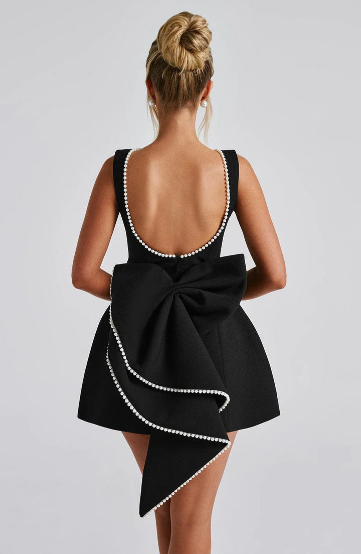 Vestito corto donna con fiocco decorativo sul retro