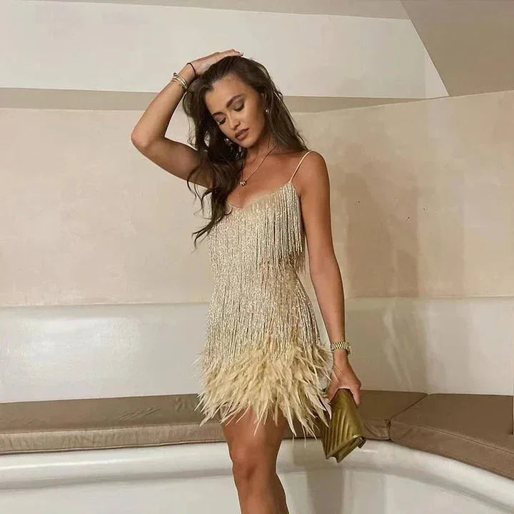 Vestito corto da sera con frange scintillanti e spalline sottili