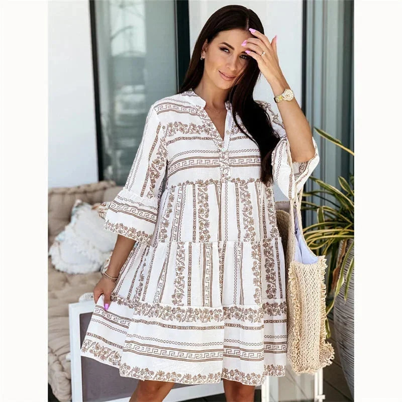 Vestito corto donna svasato a motivi scollo a V maniche ampie