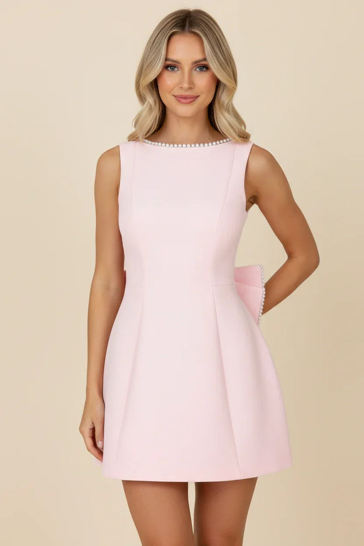 Vestito da sera da donna rosa con fiocco sulla schiena