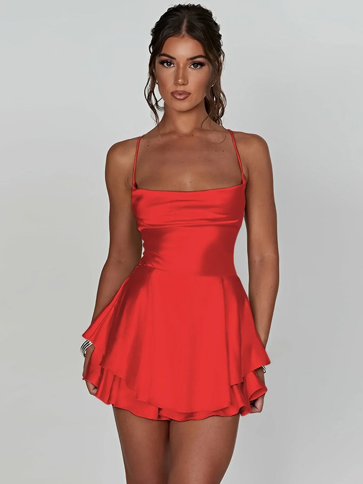 Vestito corto schiena nuda donna con spalline e gonna svasata