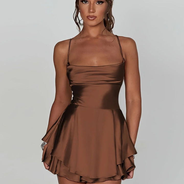 Vestito corto schiena nuda donna con spalline e gonna svasata