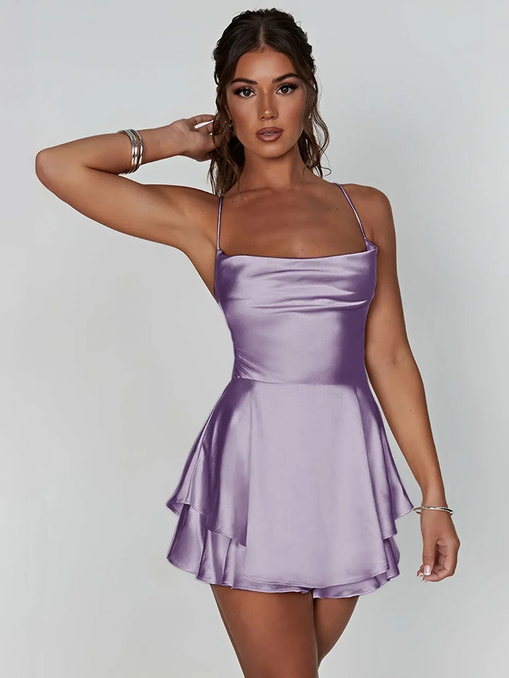 Vestito corto schiena nuda donna con spalline e gonna svasata