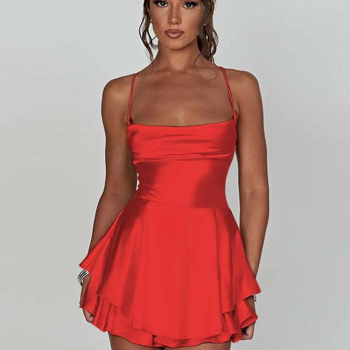 Vestito corto schiena nuda donna con spalline e gonna svasata
