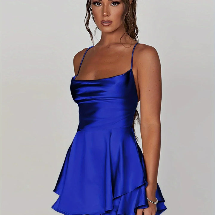 Vestito corto schiena nuda donna con spalline e gonna svasata
