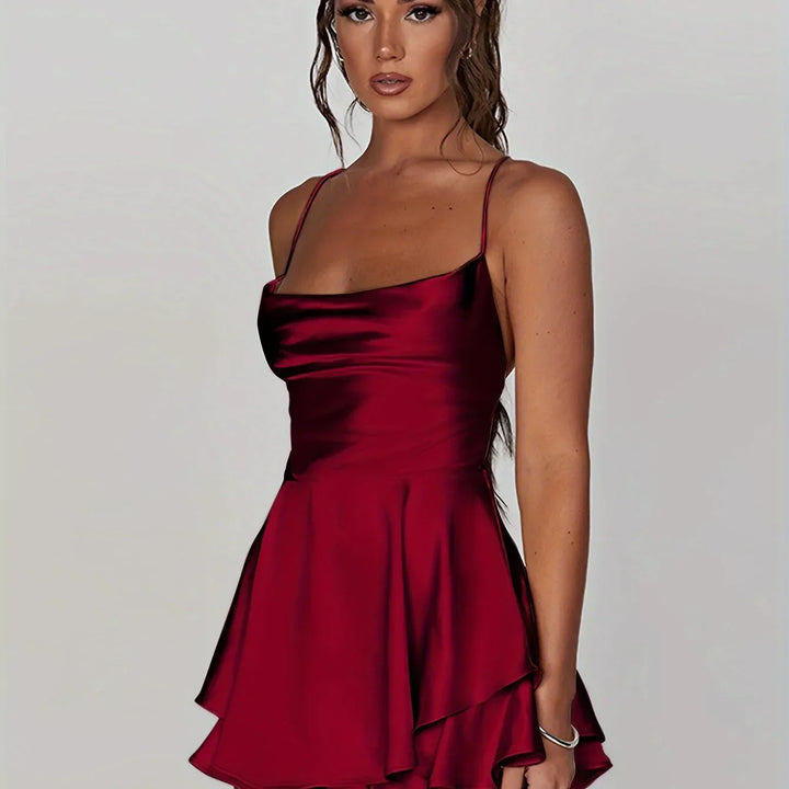 Vestito corto schiena nuda donna con spalline e gonna svasata