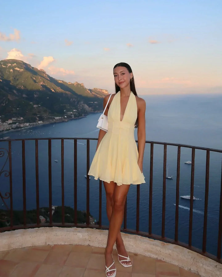Vestito corto estivo donna giallo schiena nuda