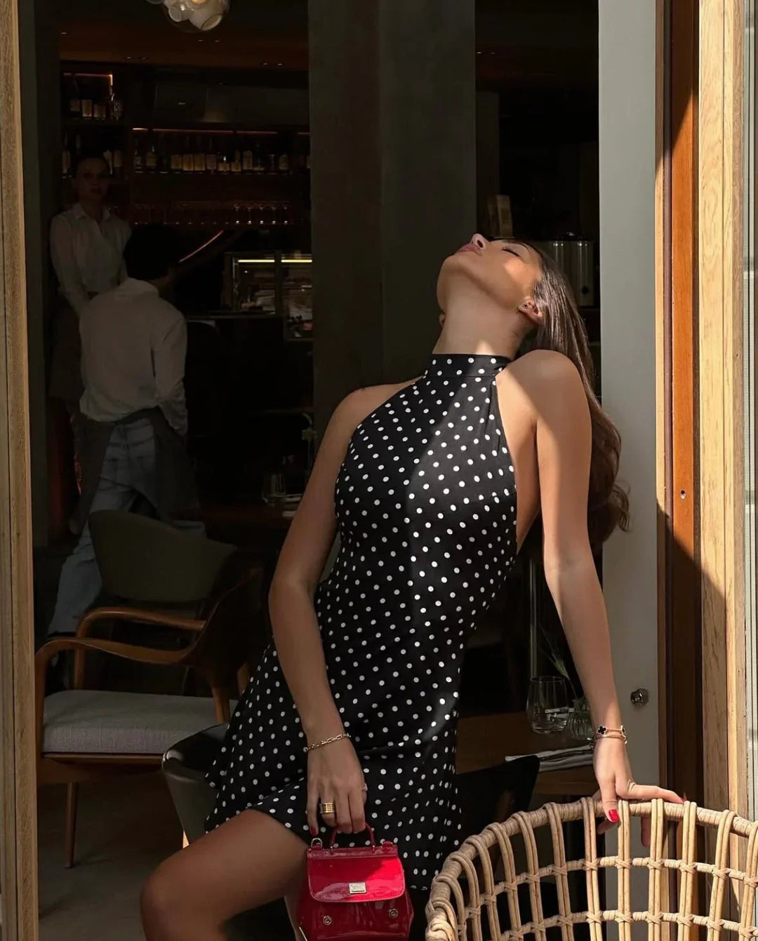 Vestito corto da donna nero a pois