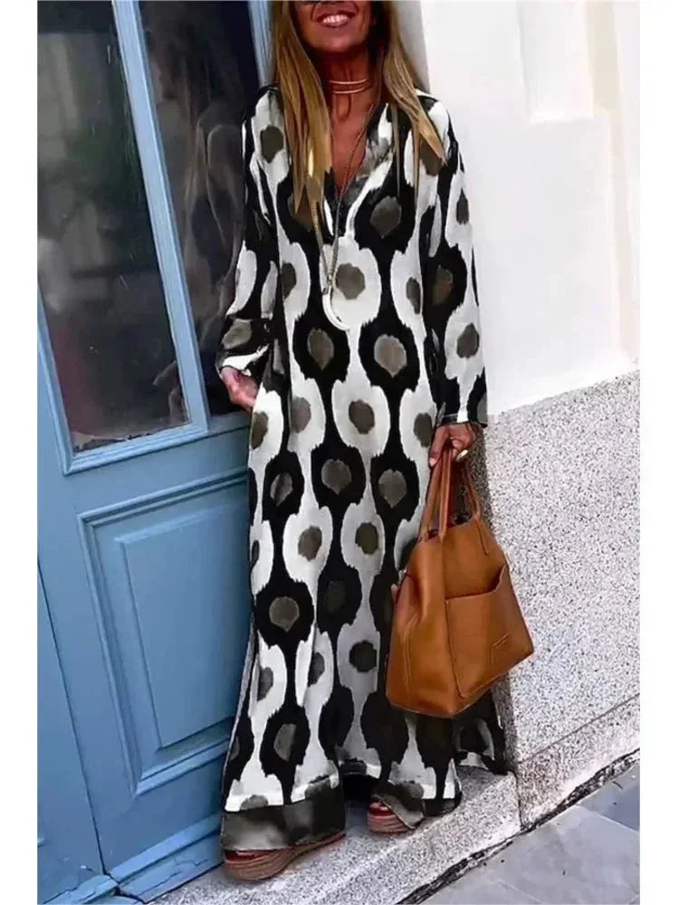 Vestito lungo donna con maniche lunghe, stampa, scollo a V e taglio fluido