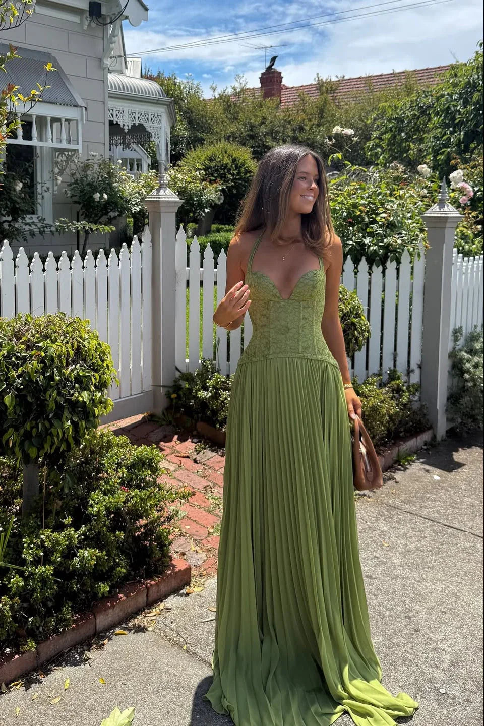Vestito lungo da donna verde plissettato con corsetto
