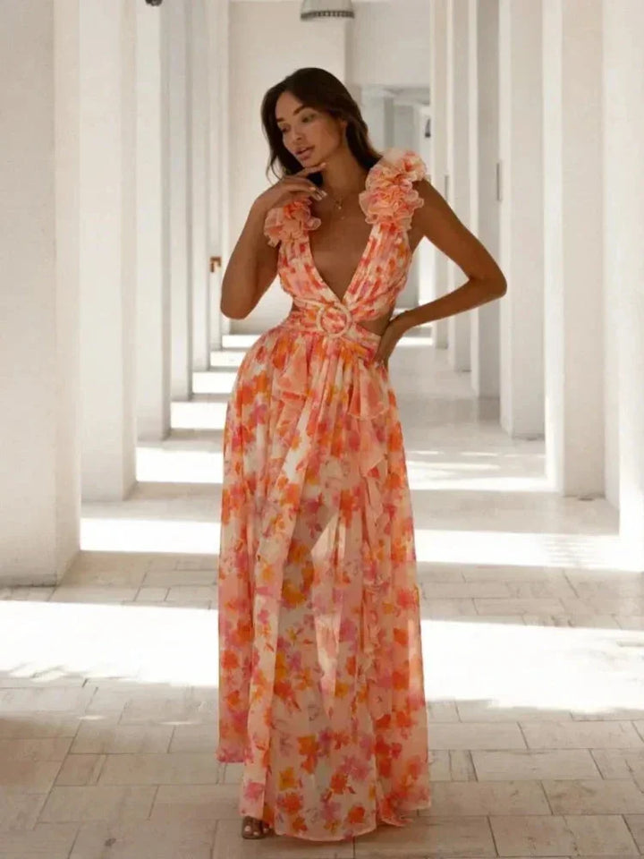 Vestito lungo rosa a fiori con volant, scollo a V incrociato