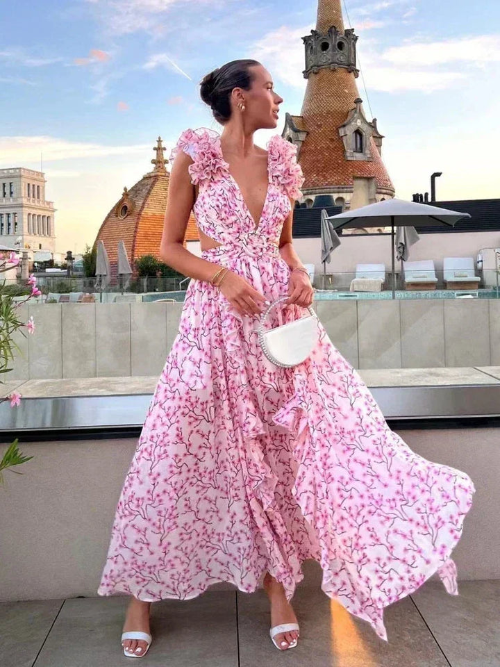 Vestito lungo rosa a fiori con volant, scollo a V incrociato