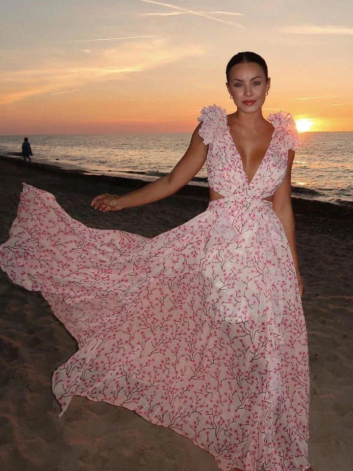Vestito lungo rosa a fiori con volant, scollo a V incrociato