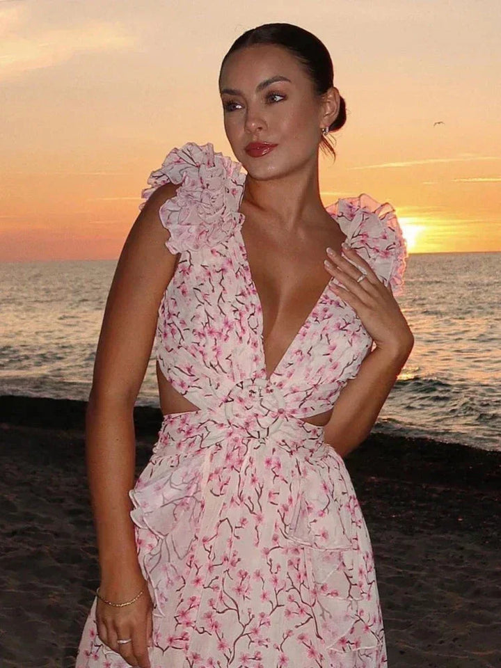 Vestito lungo rosa a fiori con volant, scollo a V incrociato