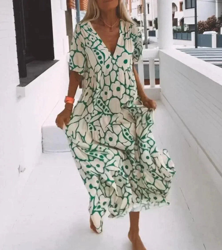 Vestito lungo estate donna con scollo a V, maniche corte e fantasia floreale