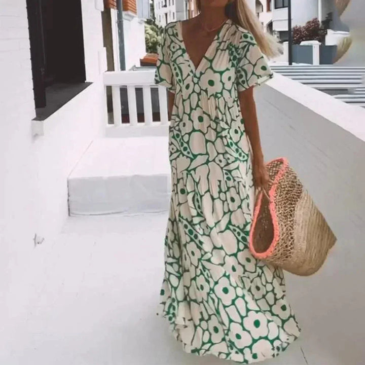 Vestito lungo estate donna con scollo a V, maniche corte e fantasia floreale