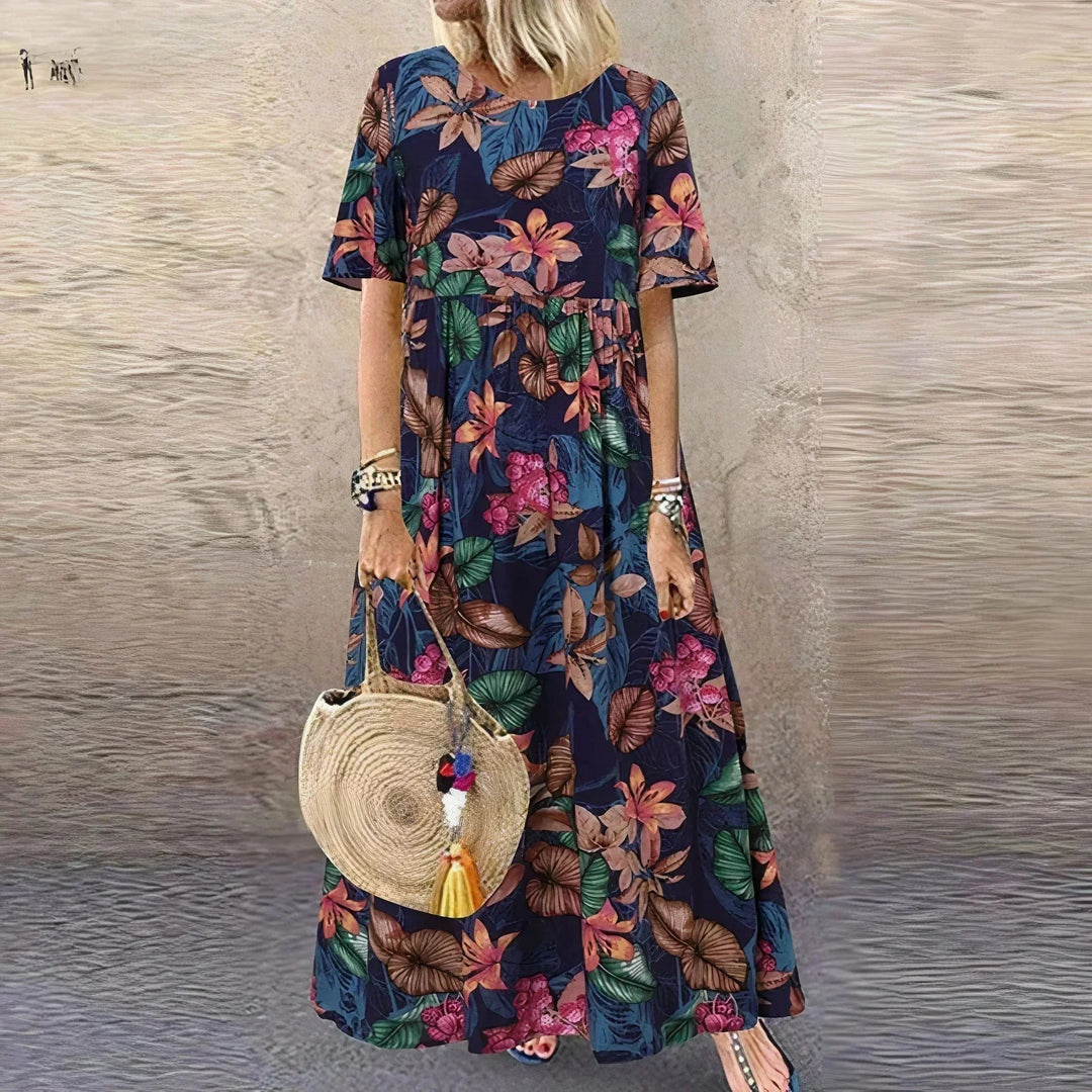 Vestito lungo con volant, motivo botanico e maniche corte