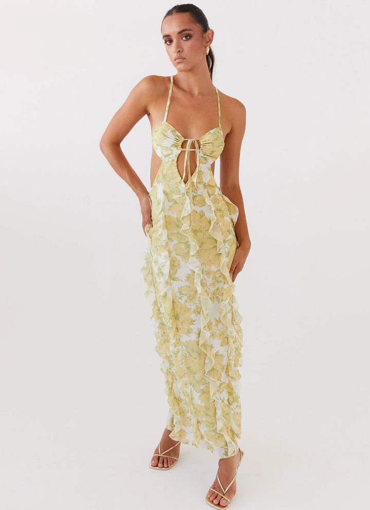 Vestito lungo con volant motivo floreale giallo