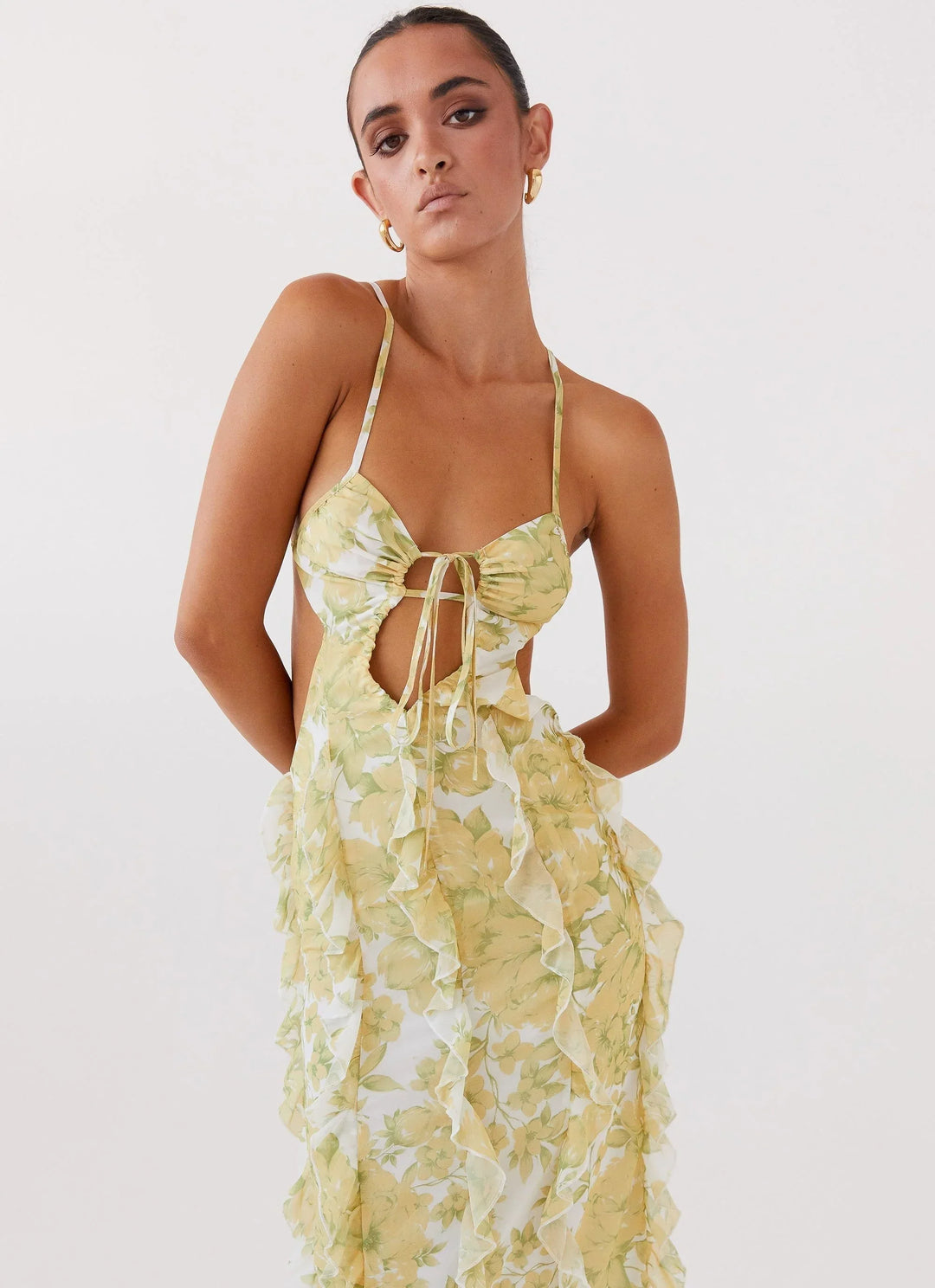 Vestito lungo con volant motivo floreale giallo