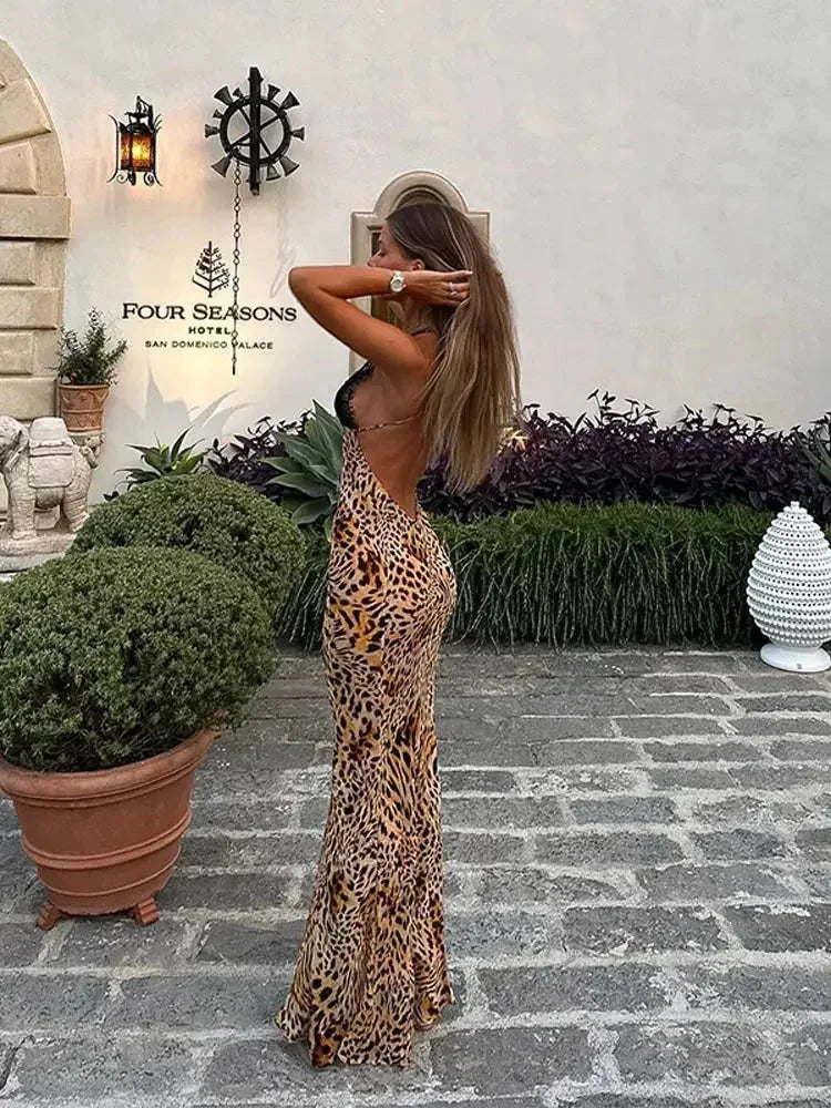 Vestito lungo con stampa leopardata scollo profondo senza maniche