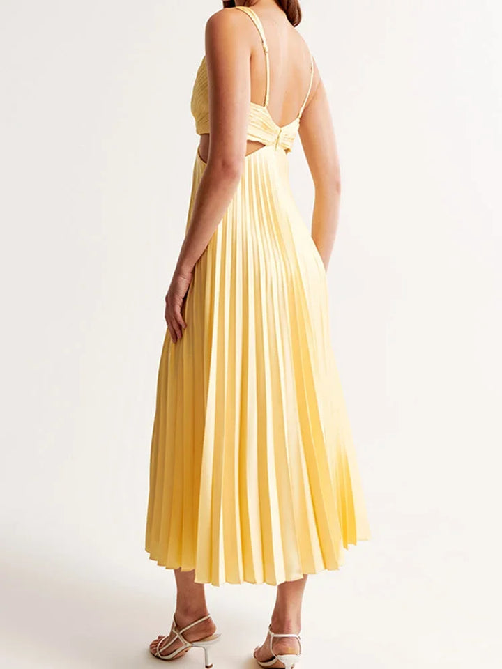 Vestito lungo giallo con scollo profondo e pieghe