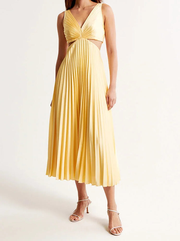 Vestito lungo giallo con scollo profondo e pieghe