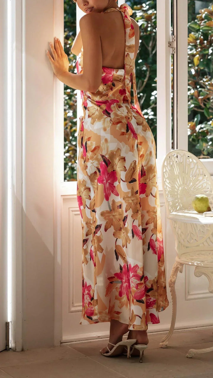 Vestito lungo donna schiena nuda con collo alto floreale