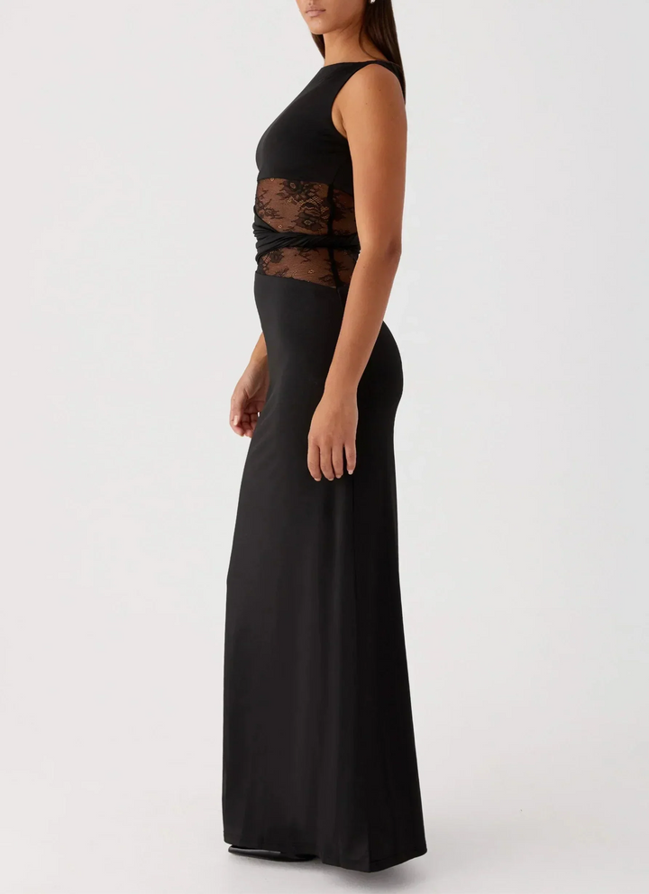 Vestito lungo nero con pizzo e découpe