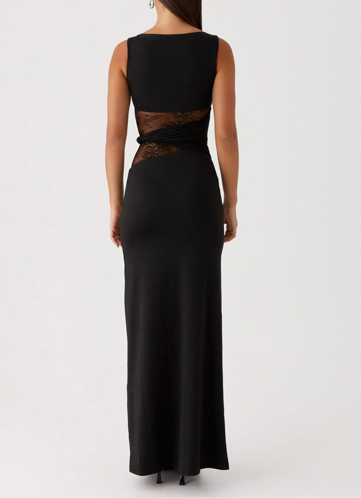 Vestito lungo nero con pizzo e découpe
