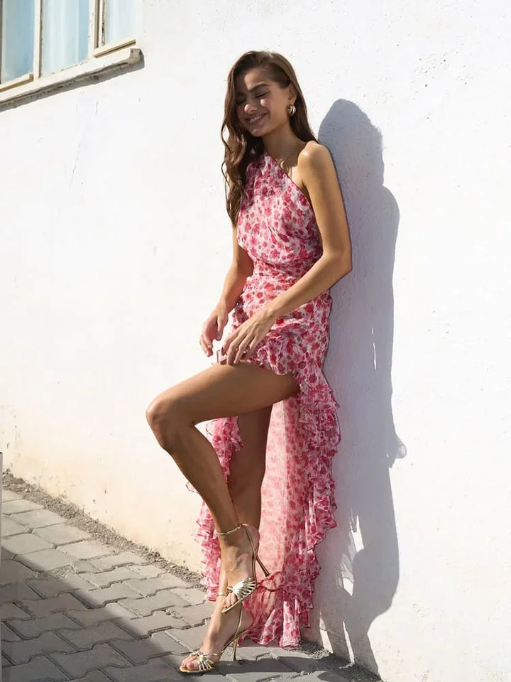 Vestito lungo rosso floreale monospalla con volant e spacco