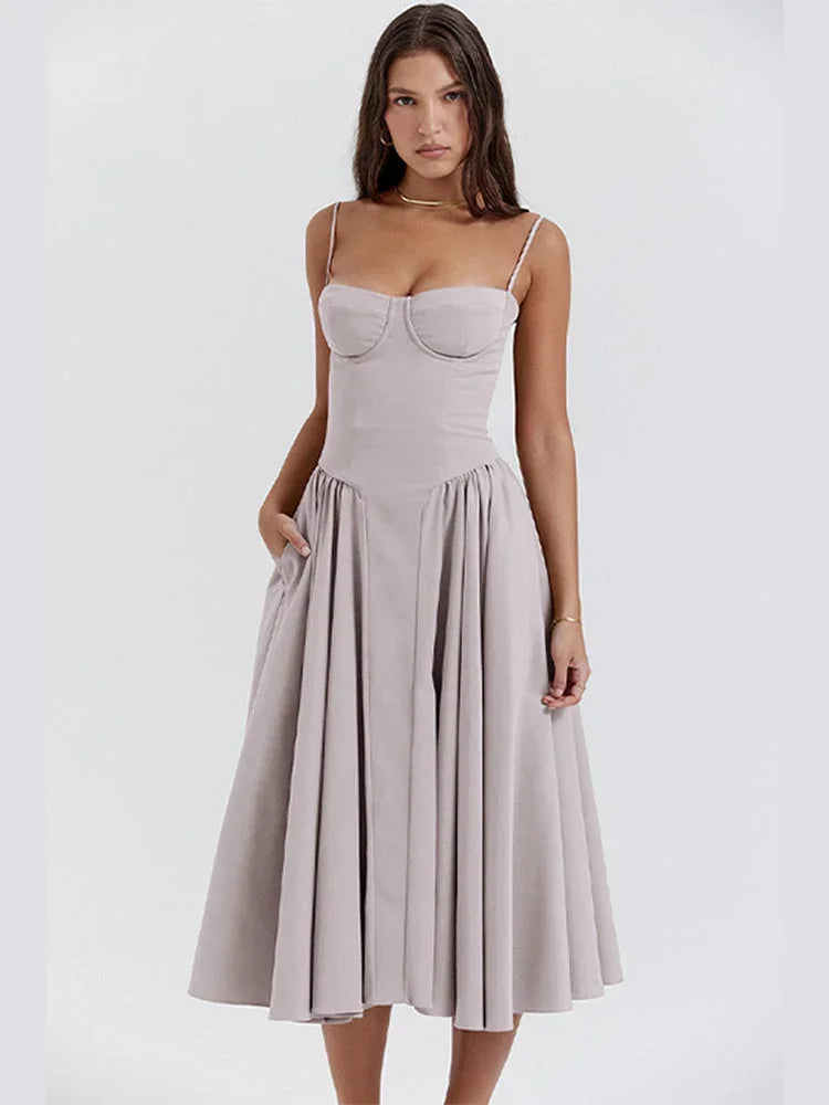 Abito midi donna svasato con spalline e tasche